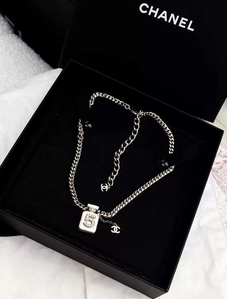 Chanel 22S White Pearl No. 5 Perfume Bottle Necklace