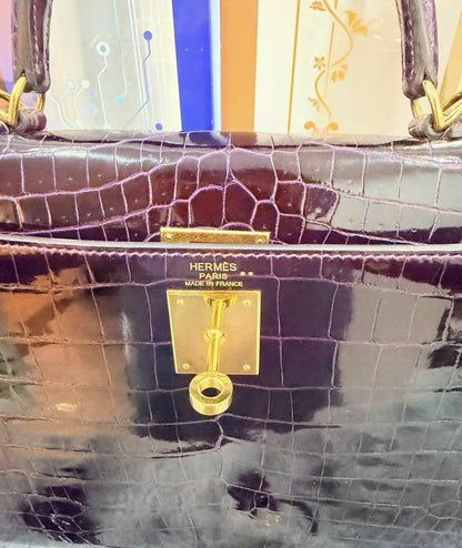 Hermès Kelly 28 Anémone / Raisin Shiny Niloticus Crocodile with Gold Hardware