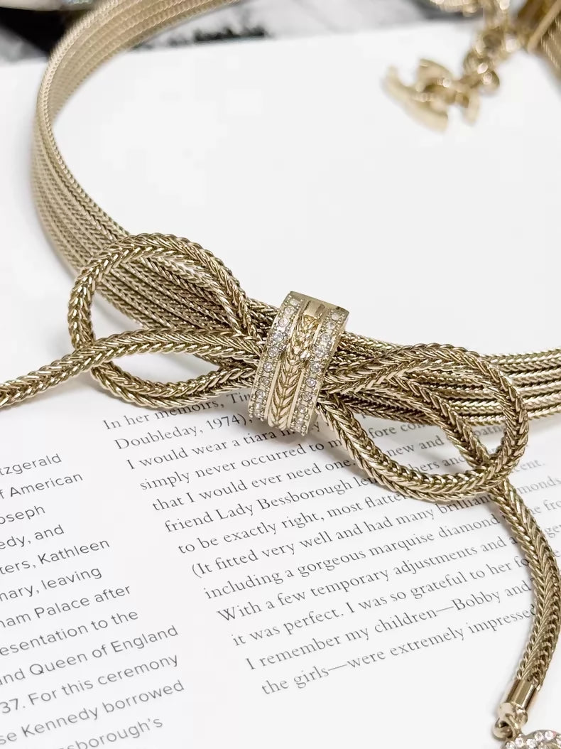 Chanel 2024 Fall/Winter collection gold bow necklace