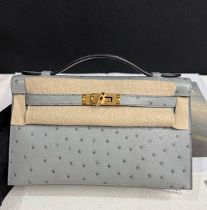 Hermes Kelly Pochette Blue glacier ostrich gold hardware