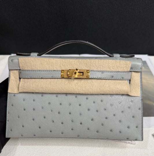 Hermes Kelly Pochette Blue glacier ostrich gold hardware