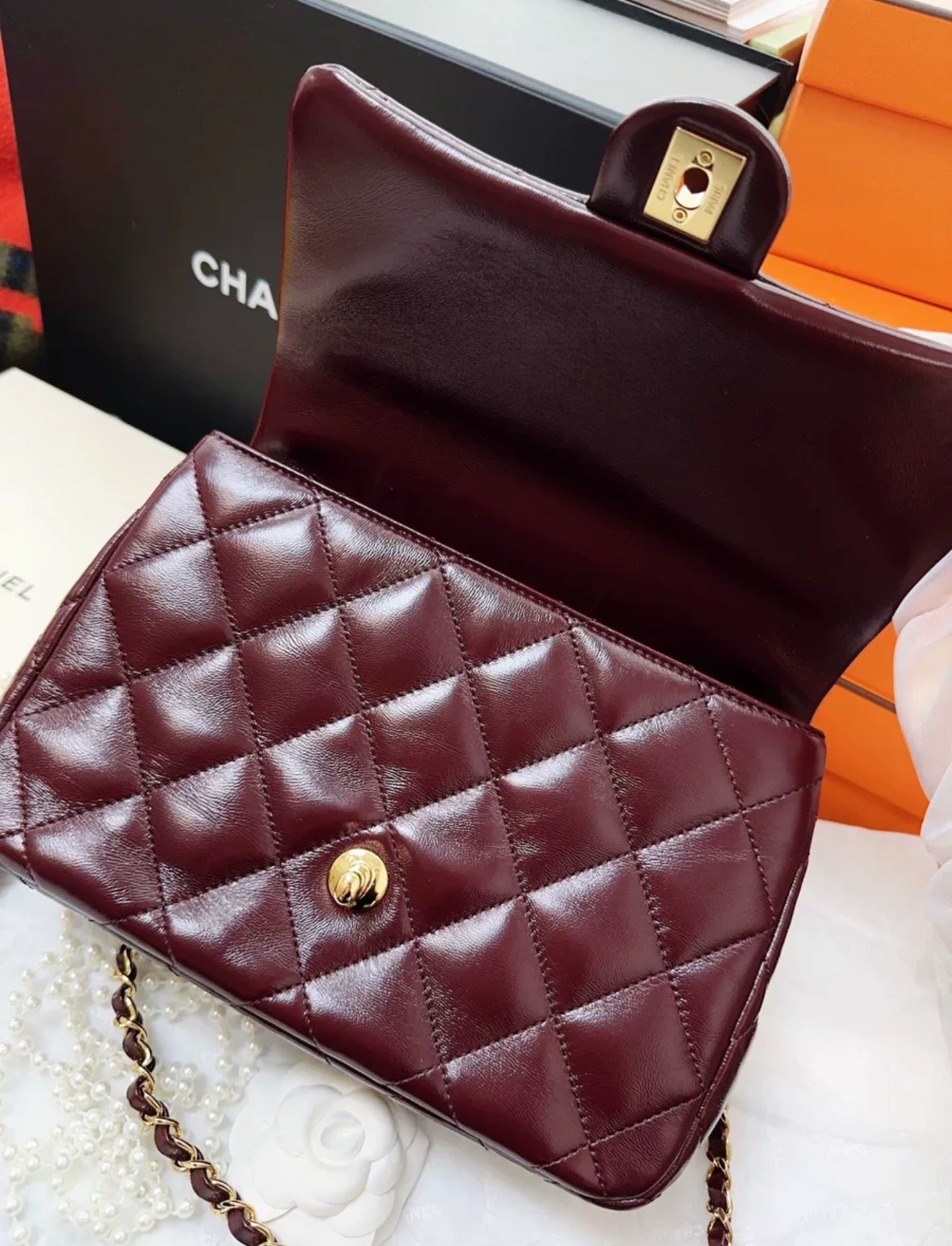 Chanel 24b burgundy sheepskin leather with gold chain top handle flap bag