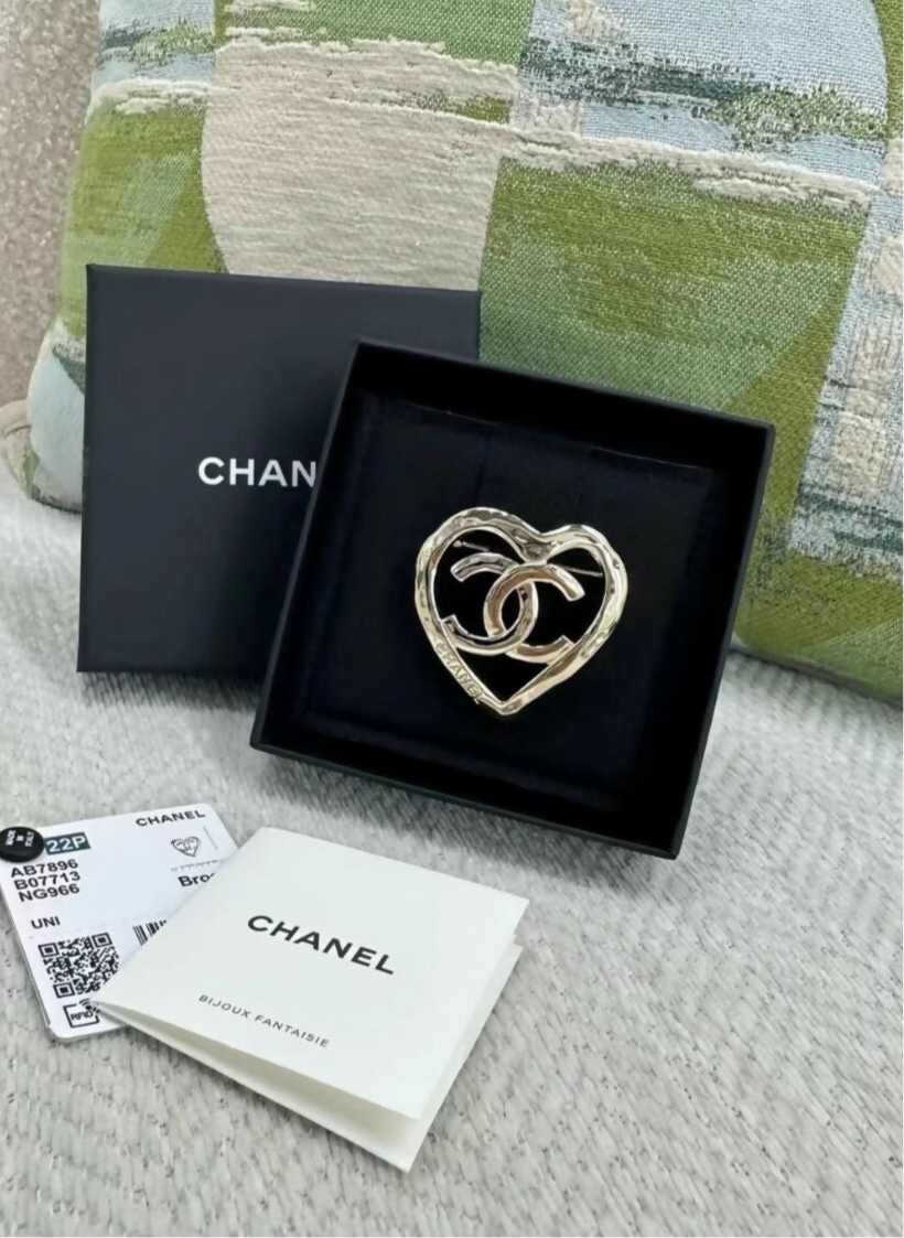 Chanel 22P gold hollow heart brooch