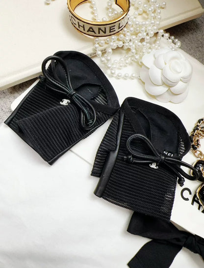 Chanel black mesh leather bow gloves
