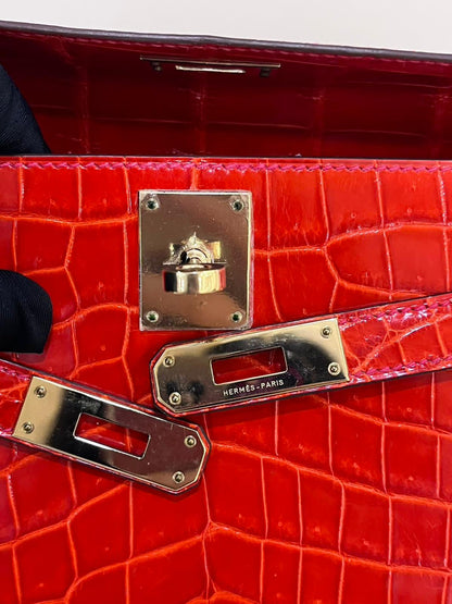 Hermes Kelly cut red shiny crocodile leather gold hardware