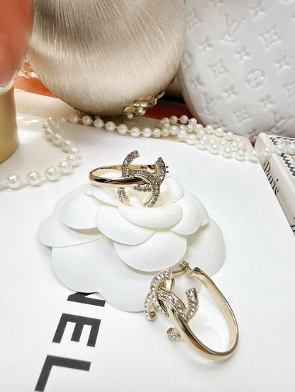 Chanel 22 gold double C logo diamond hoop earrings