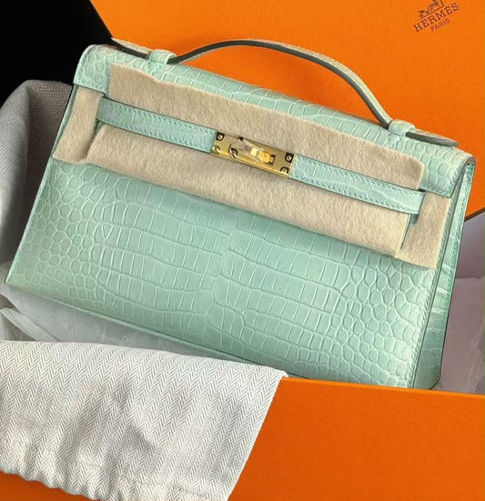 Hermes Kelly Pochette vert d’eau matte porosus crocodile leather gold hardware