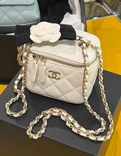 CHANEL Lambskin Quilted Small Camellia Bow Vanity Case With Chain