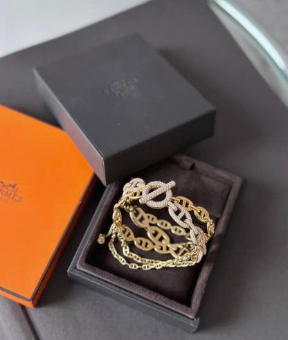 Hermès Chaine d’Ancre Enchaînée bracelet in yellow gold with pavé diamonds