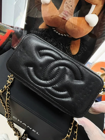 Chanel 23B black and gold lychee leather vanity bag with letter chain strap