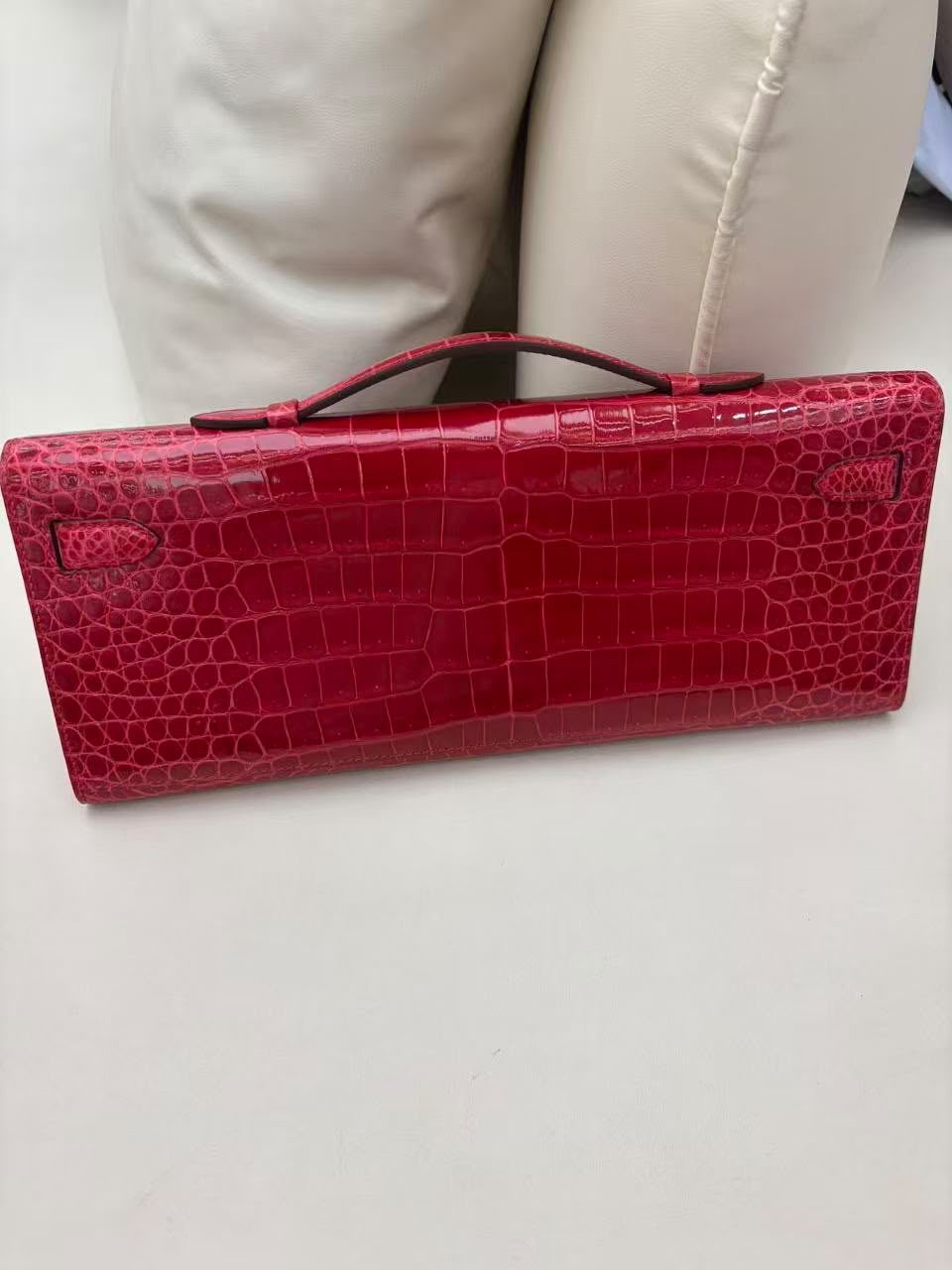 Hermes Kelly cut Braise shiny porosus crocodile leather gold hardware