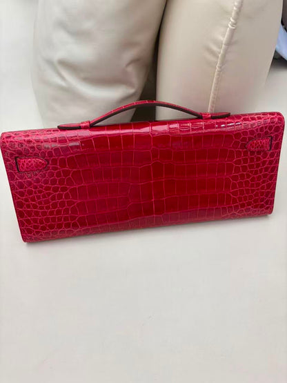 Hermes Kelly cut Braise shiny porosus crocodile leather gold hardware