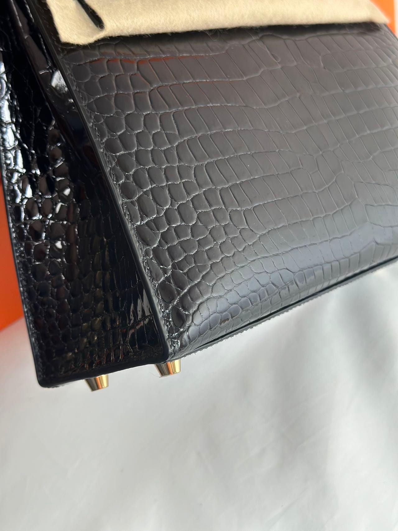 Hermès Kelly Midas 25 Noir Shiny Crocodile Porosus 18k yellow gold hardware & handle