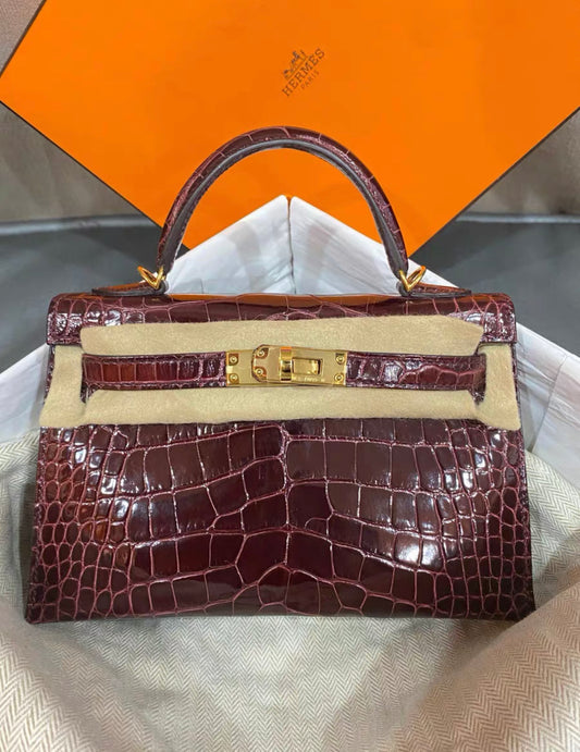 Hermes kelly 20 bordeaux porosus crocodile with gold hardware price