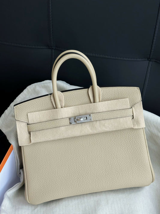 Hermès Birkin handbag in pale cream grained leather with palladium turn-lock hardware and two rolled top handles