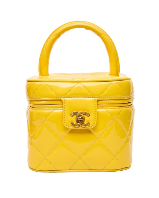 CHANEL 1995 VINTAGE "BARBIE" YELLOW PATENT HEART-MIRROR VANITY CASE BAG