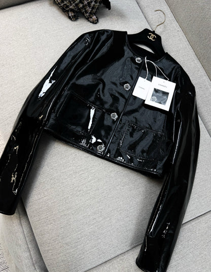 Chanel 23k black patent leather jacket