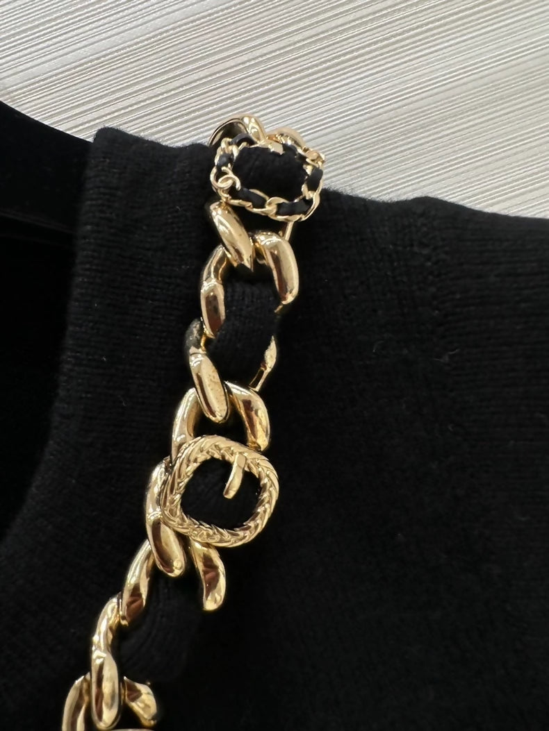 Chanel 24A black and gold cashmere vest with chain