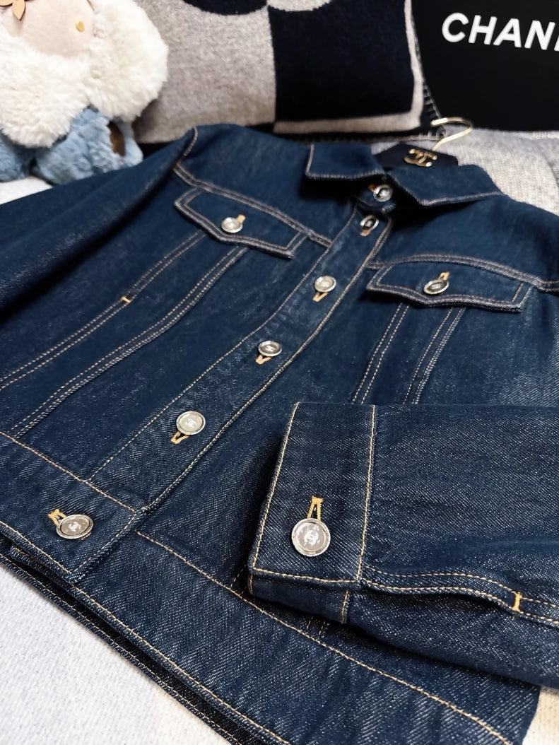 Chanel 25C navy blue denim jacket with silver buttons