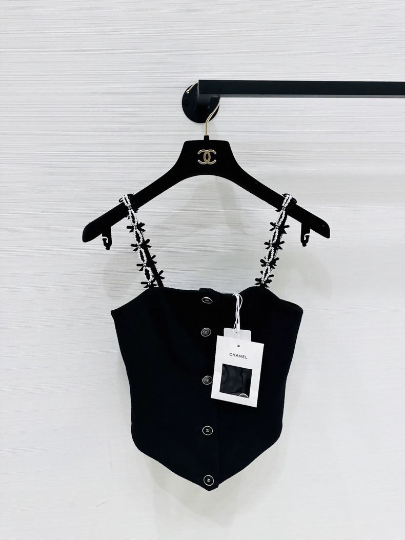 Chanel 25b black top with pearls bow