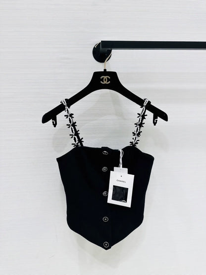 Chanel 25b black top with pearls bow
