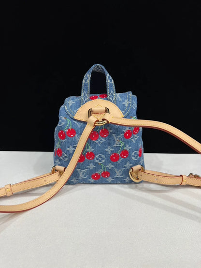Louis Vuitton Takashi Murakami collaboration cherry denim backpack
