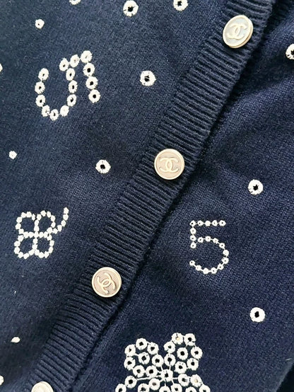 Chanel 24P navy blue, multi-element, knit cardigan.