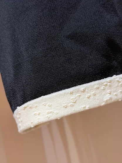 Chanel 25A Black Wide-Leg Trousers with White Trim