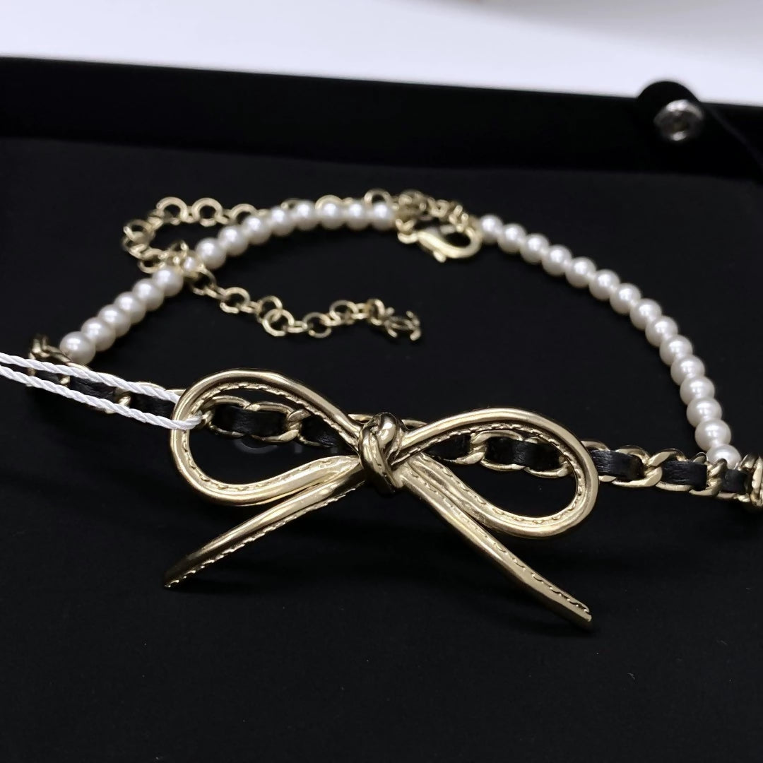 Chanel 22s bow pearl leather chain choker necklace