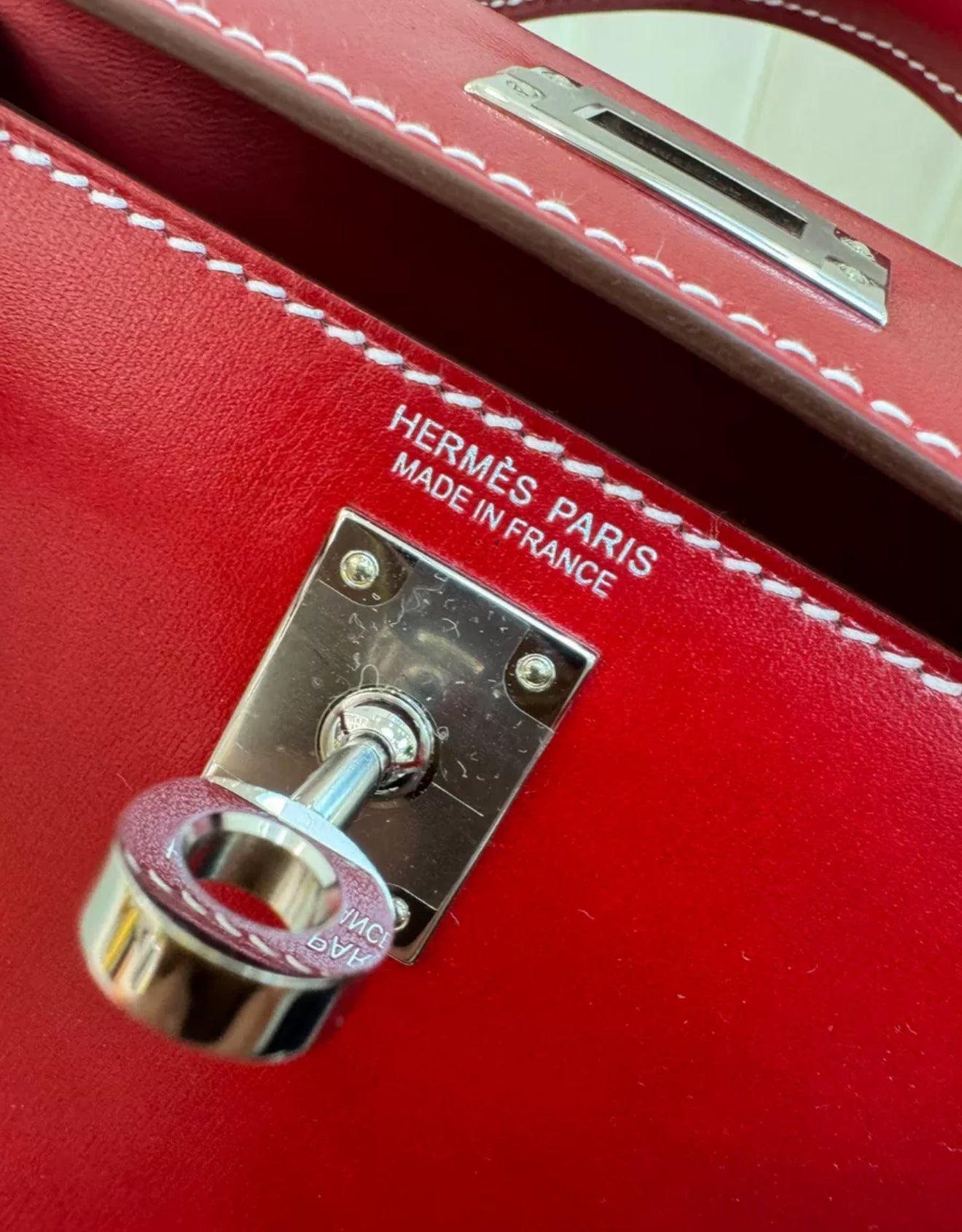 Rare Hermès Mini Kelly Ferrari red box leather with white