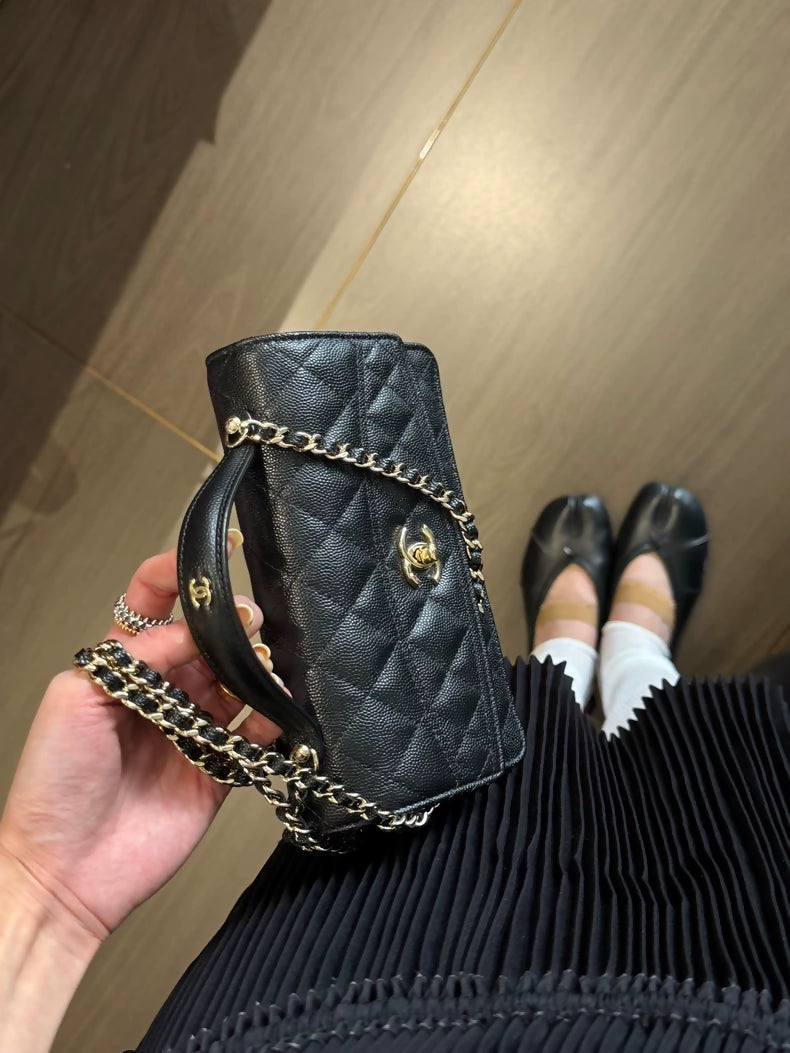 The Chanel 25C black and gold bag