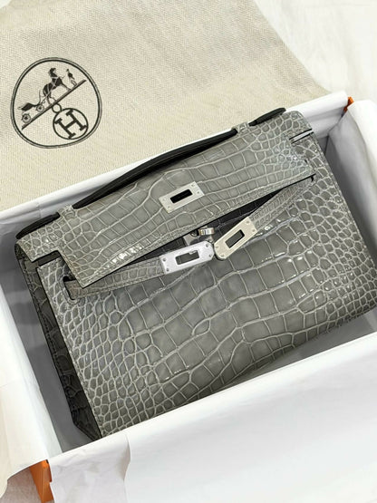 Hermès Kelly pochette Gris Plomb / Gris Micro Shiny Crocodile with Palladium Hardware