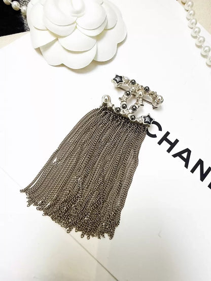 Chanel 17B pearl star double C tassel brooch