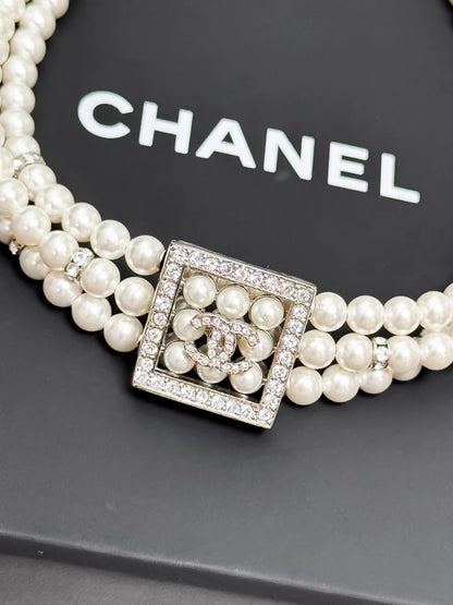 Chanel 24S pearls necklace with square rhinestones and a double-C logo
