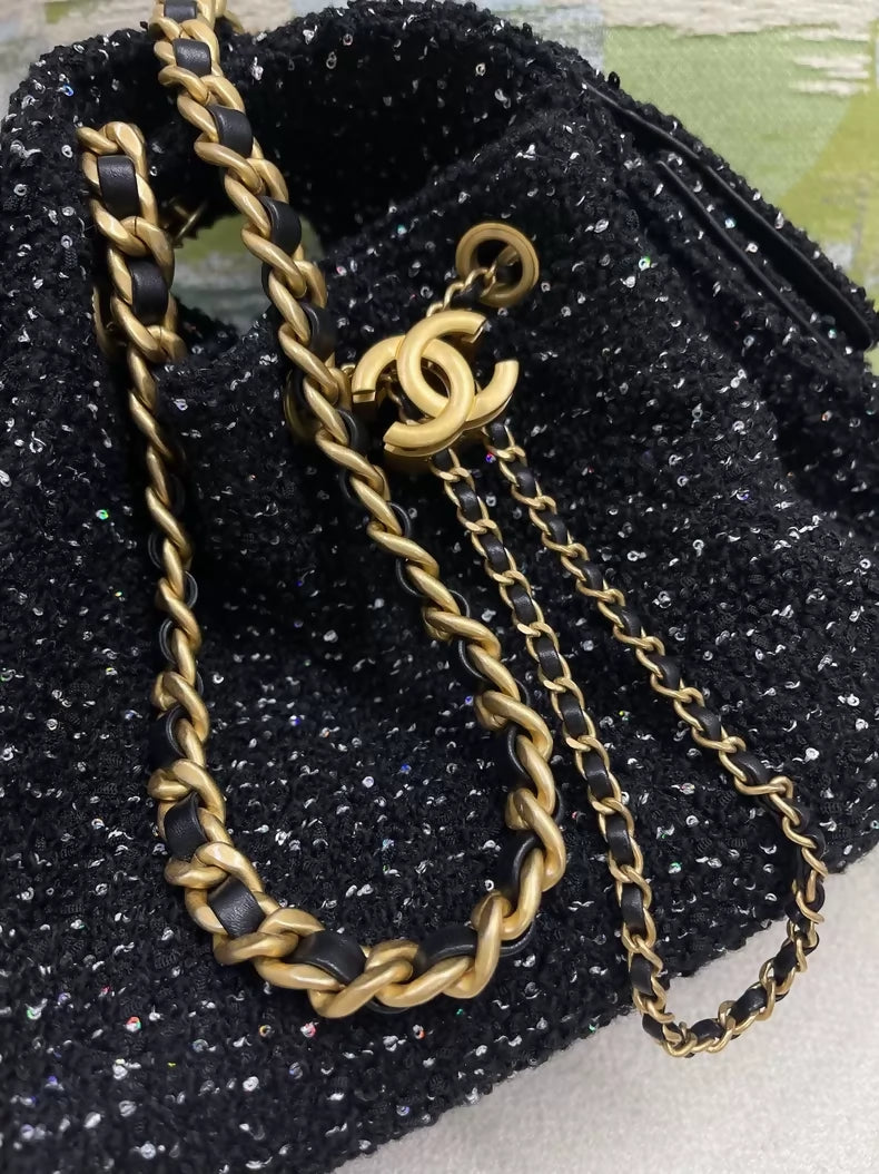 Chanel 25A black sequined tweed 25 bag