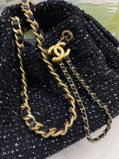 Chanel 25A black sequined tweed 25 bag