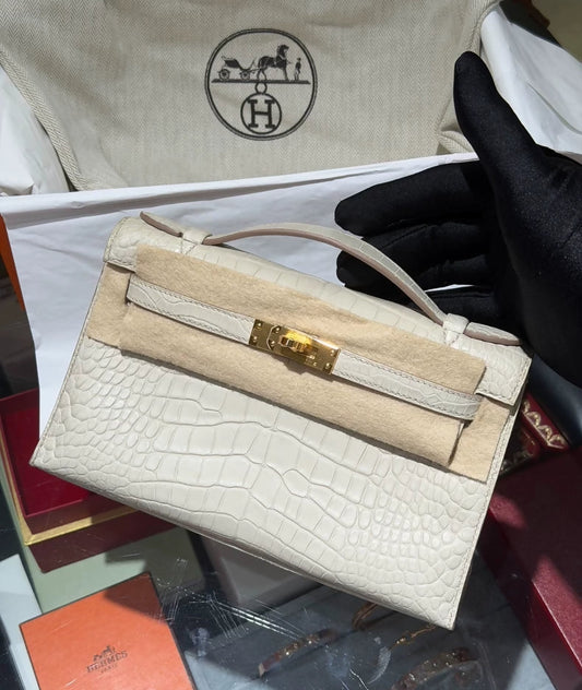 Hermes Kelly pochette cream white matte alligator leather gold hardware