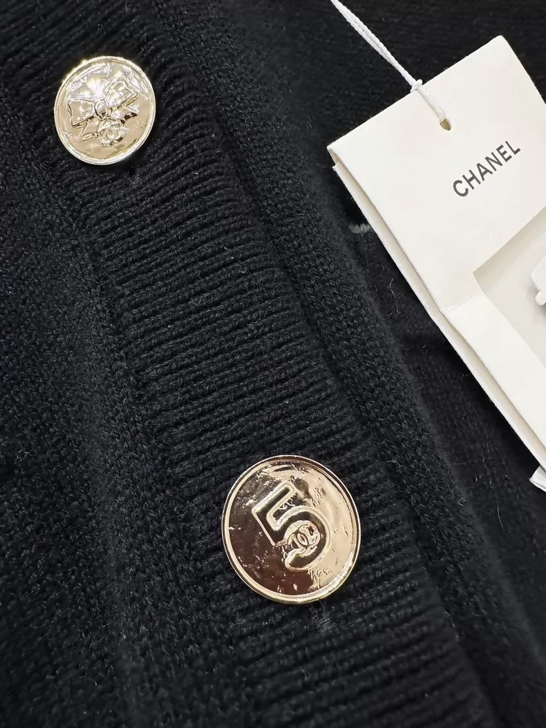 Chanel 25B black and white cashmere cardigan