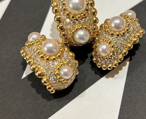 Chanel high-jewelry gold clip-on earrings + ring