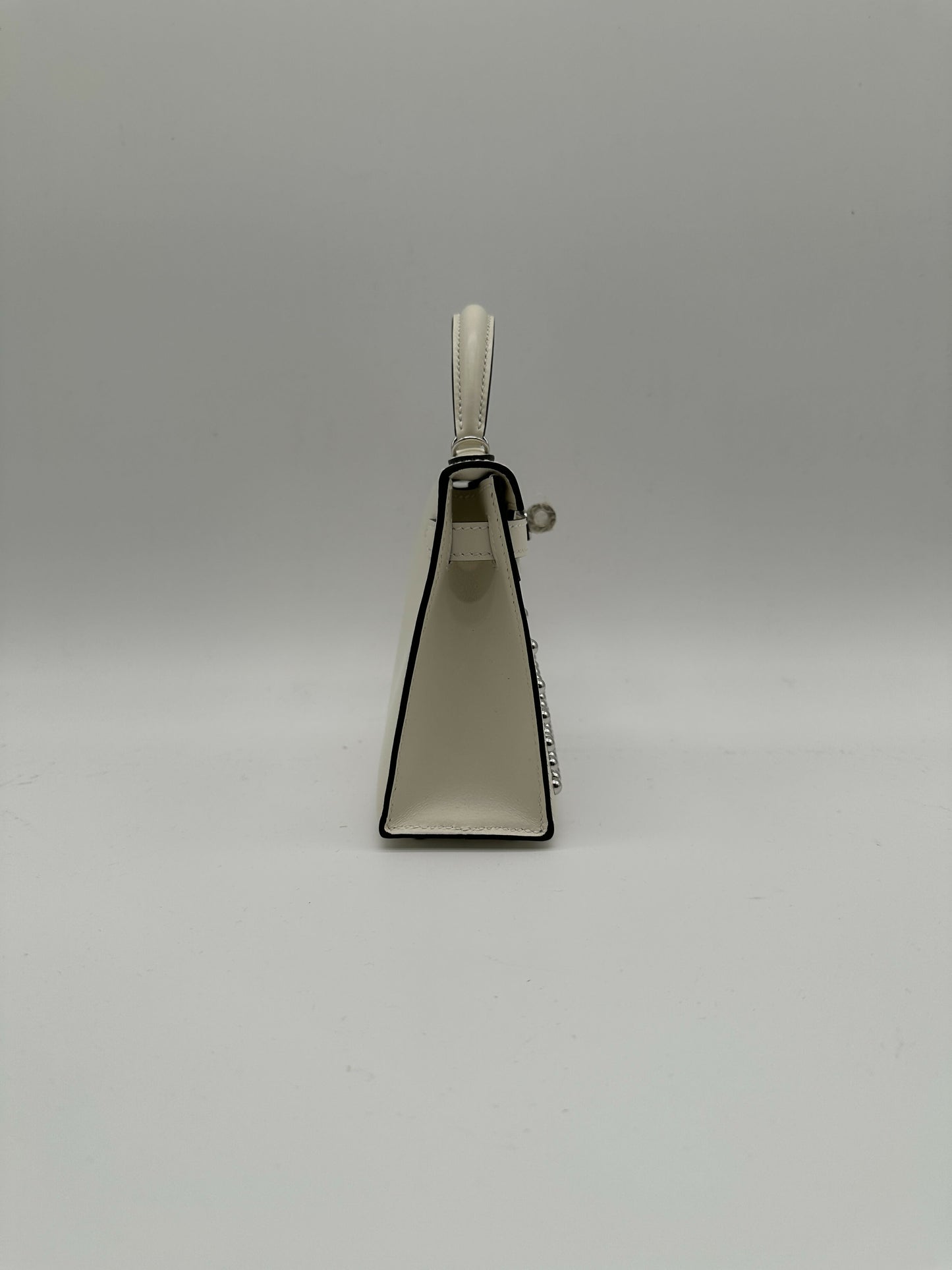 Hermès Kelly 20 Clouté Cream PHW G 2026