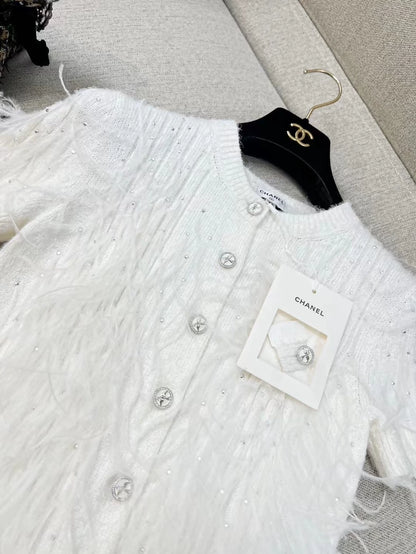 Chanel 25s white feather cardigan