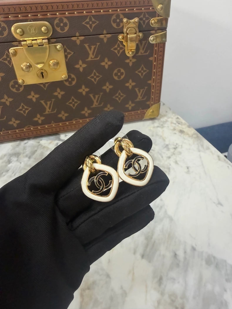 Chanel 22S Gold and Black & White Resin Double C Diamond Earrings