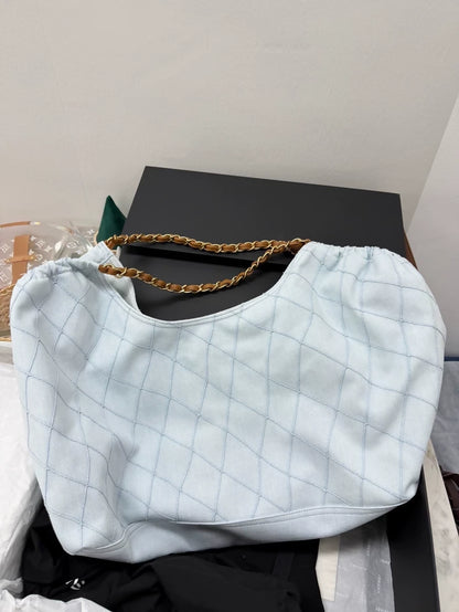 Chanel 26M Coco Beach light blue calfskin tote bag