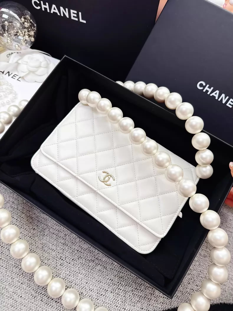 Chanel 20k ecru gold pearl chain WOC shoulder bag