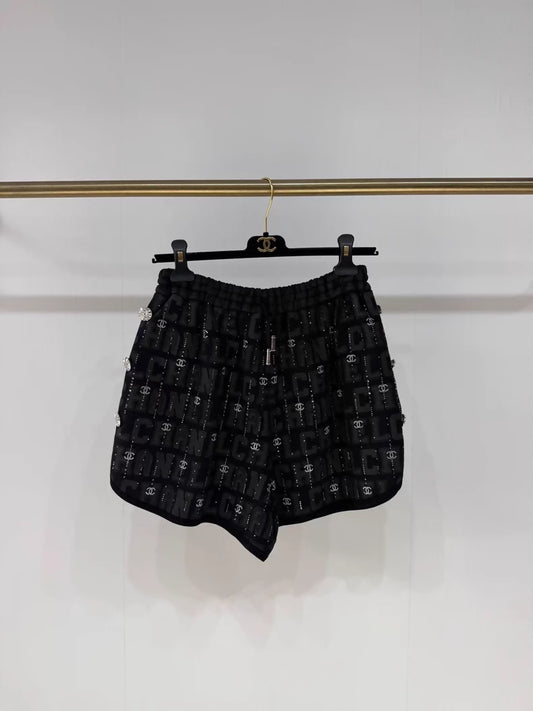 Chanel 23c black rhinestone logo shorts
