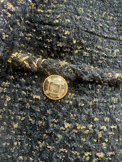 Chanel 19k black 
gold tweed jacket