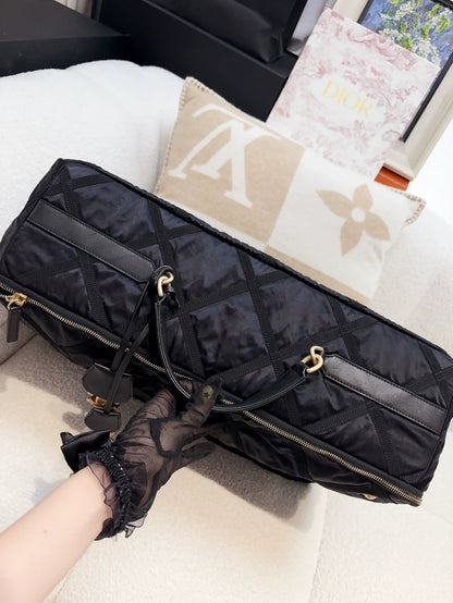 Chanel 22P travel box in black quilted nylon