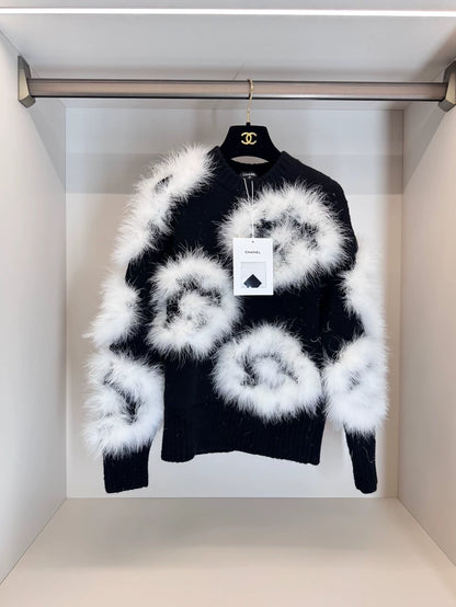 Chanel 23K  black sweater with white ostrich feather
