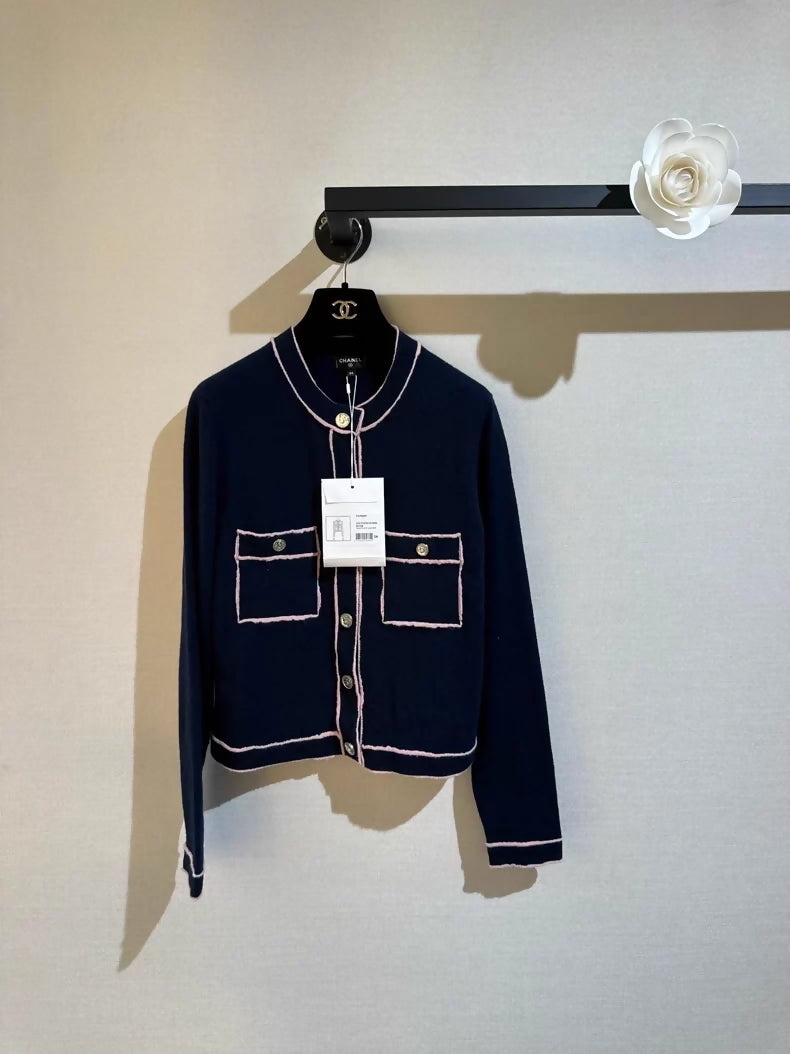 Chanel 21K navy blue round neck cardigan with pink trim