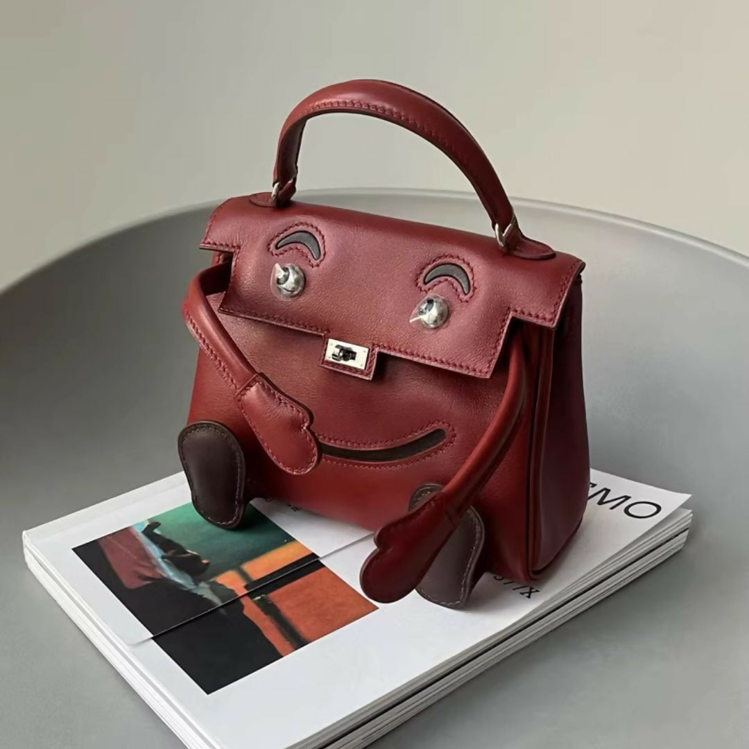 Hermès Kelly Doll in Rouge H Swift Leather with palladium Hardware